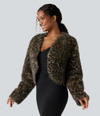 Manteau cape fausse fourrure col V manches longues