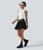 Jupe-short de tennis mini taille haute croisée fluide avec poches