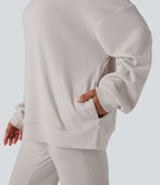 Sweat-shirt gaufré col montant manches longues coupe décontractée avec poches