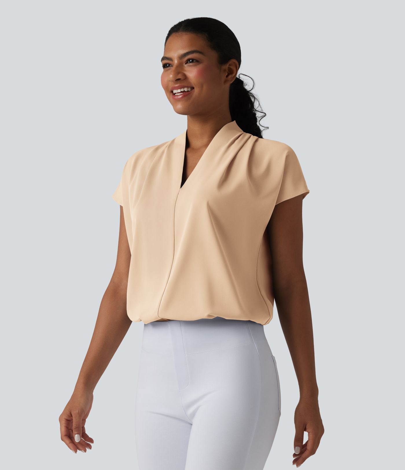 Blouse esprit bureau ample défroissage facile, col V et manches chauve-souris