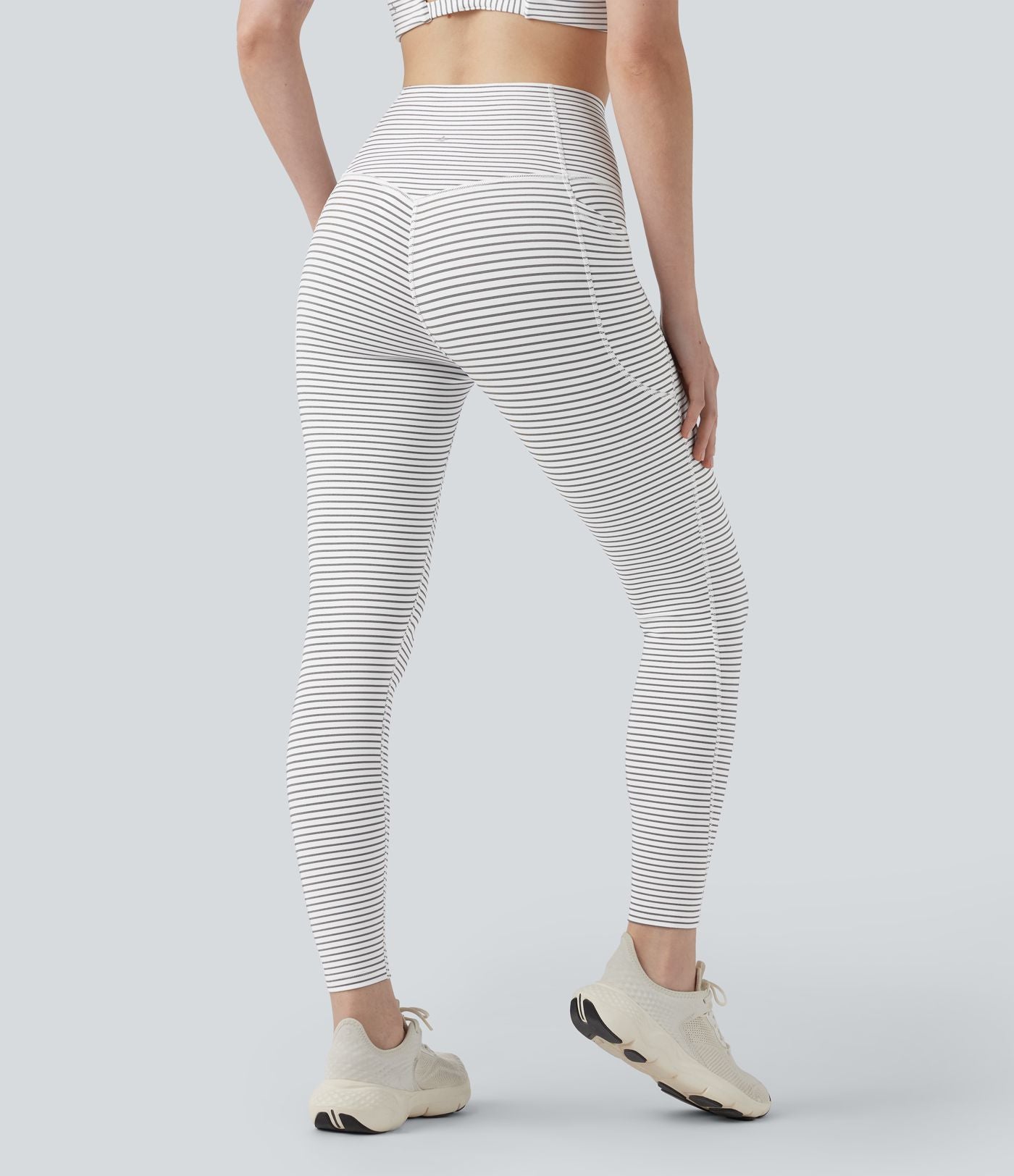 Legging de yoga taille haute gainant à rayures avec poches