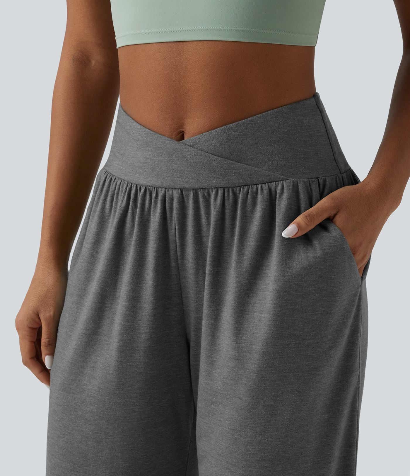 Pantalon décontracté taille haute croisé à ourlet courbe avec poches
