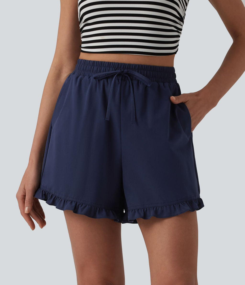 Short casual ample taille haute en popeline extensible à cordon de serrage et ourlet volants avec poches