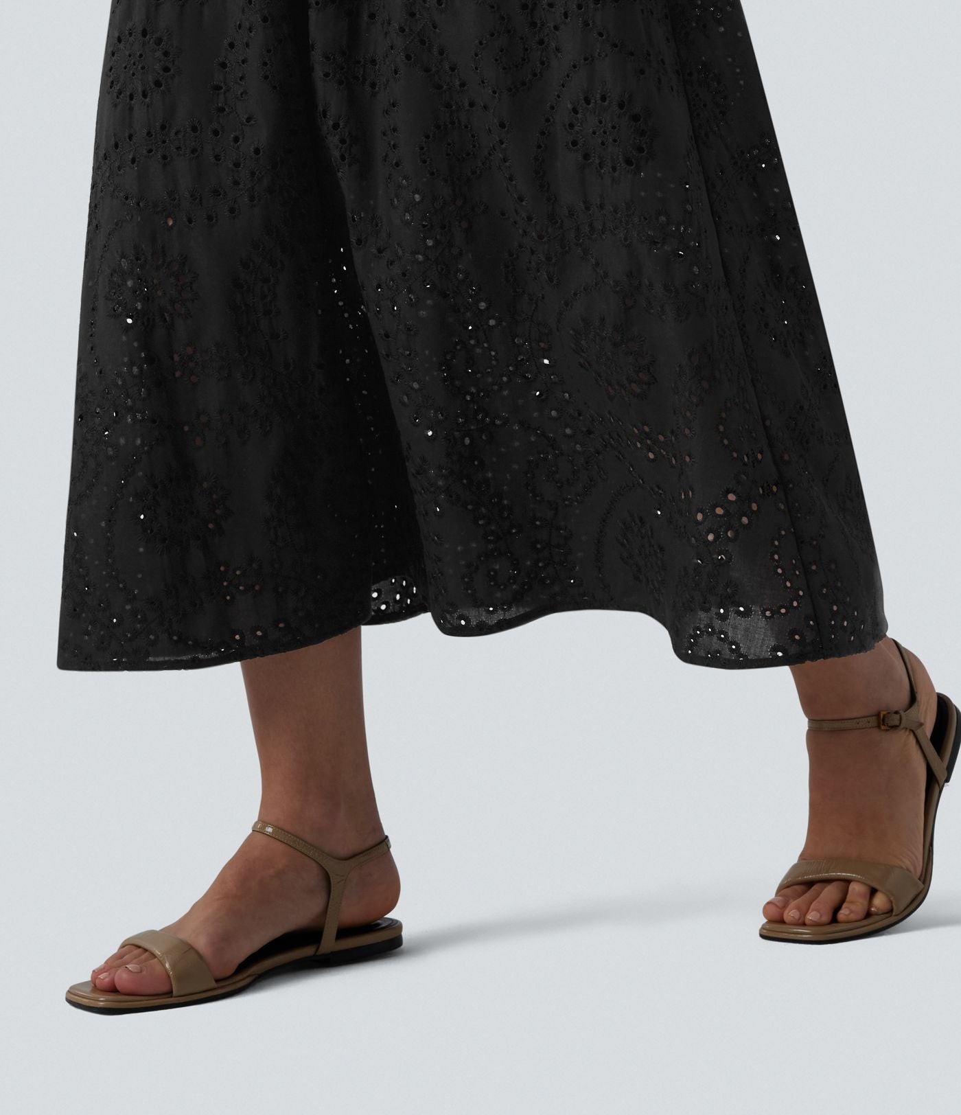 Robe mi-longue fluide col V sans manches avec nœud au dos