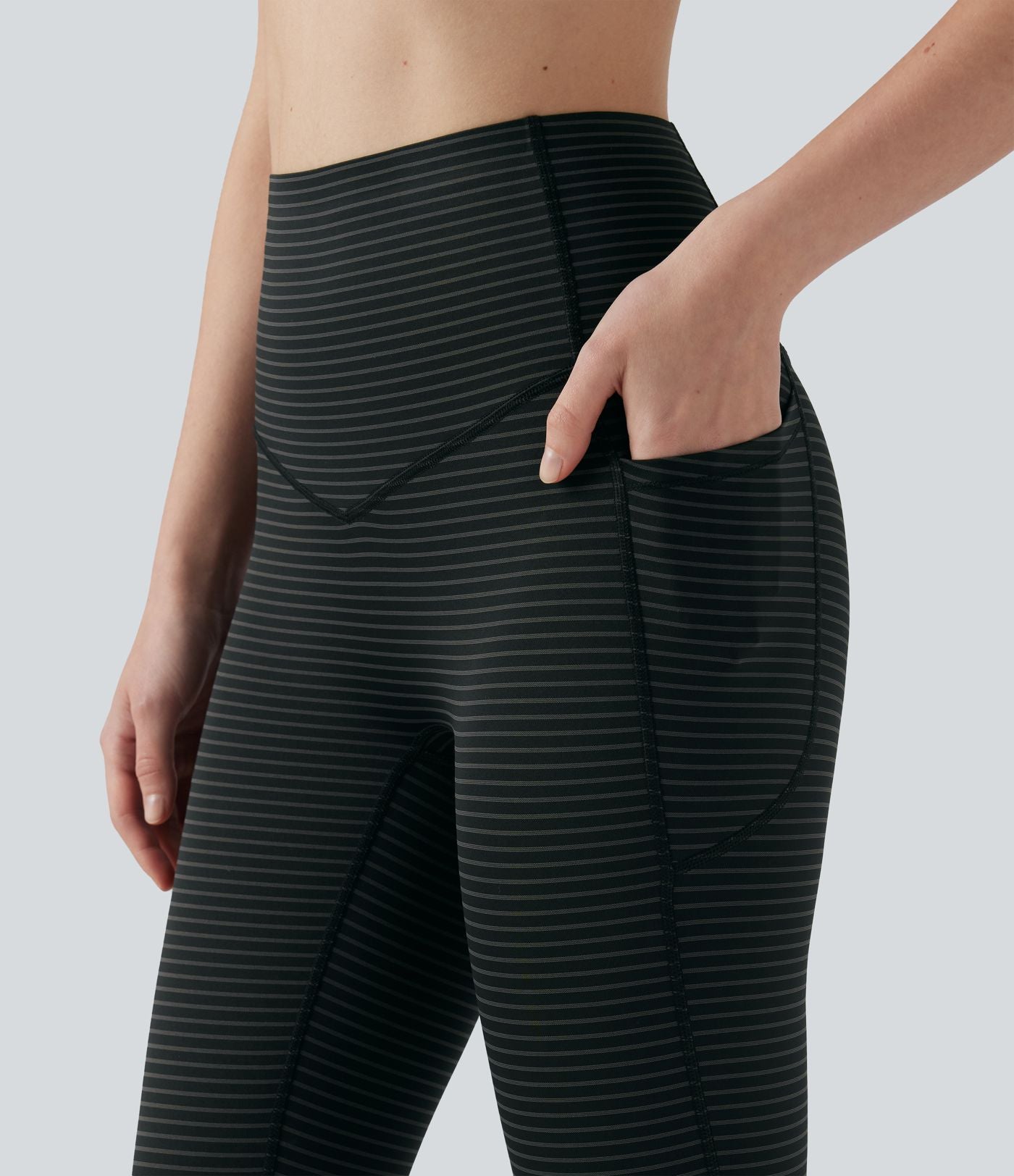 Legging de yoga taille haute gainant à rayures avec poches
