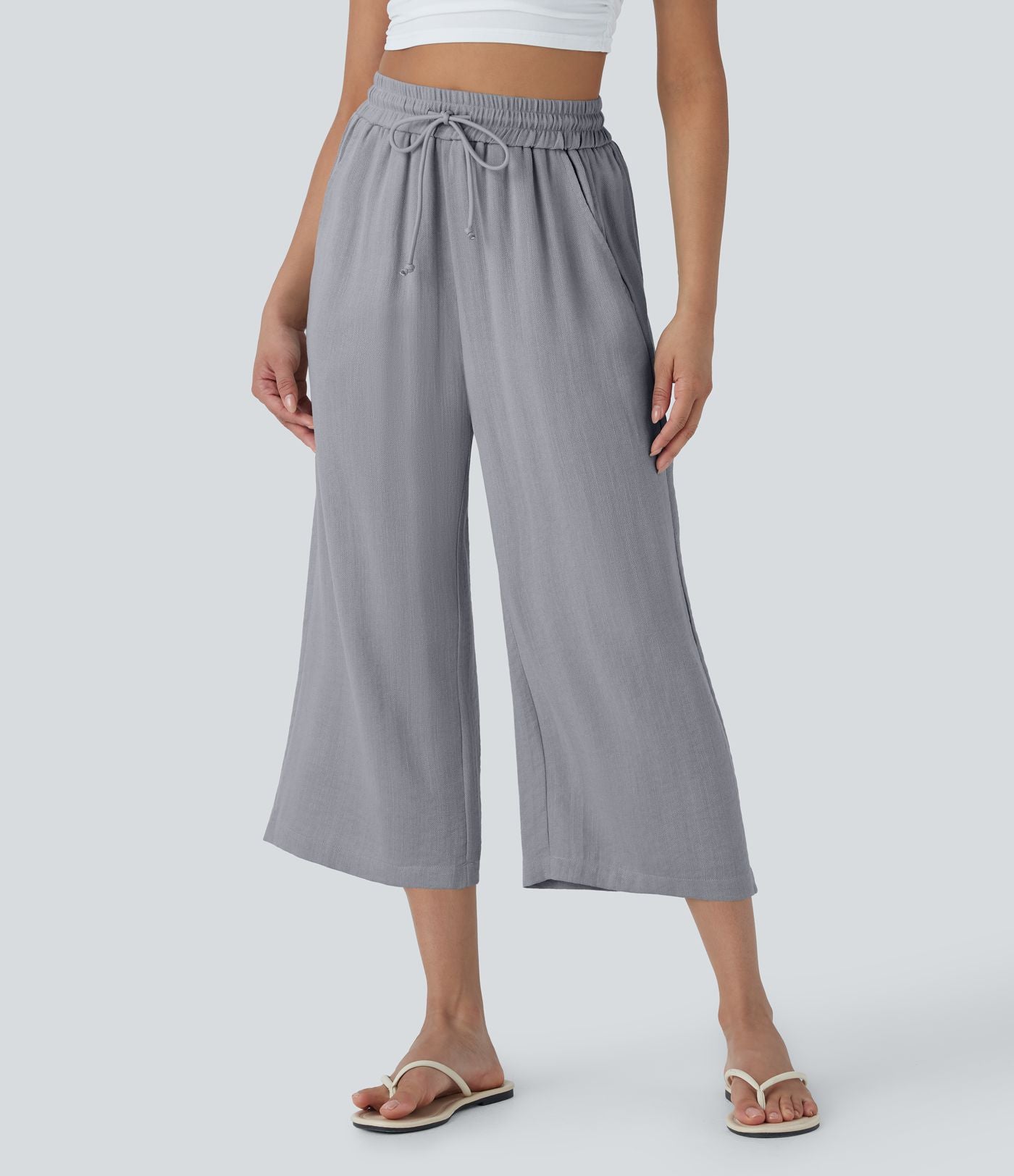 Pantalon décontracté aspect lin 7/8 à taille haute, jambe large avec cordon de serrage et poches latérales