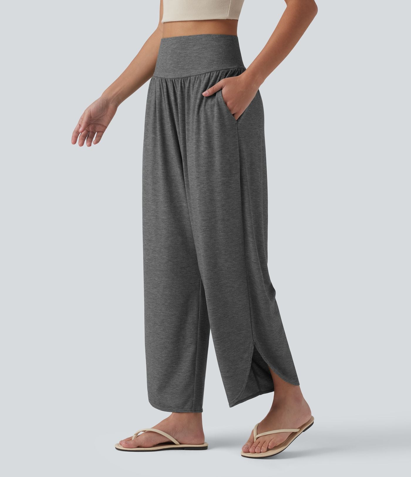 Pantalon décontracté taille haute gainant avec ourlet arrondi et poches