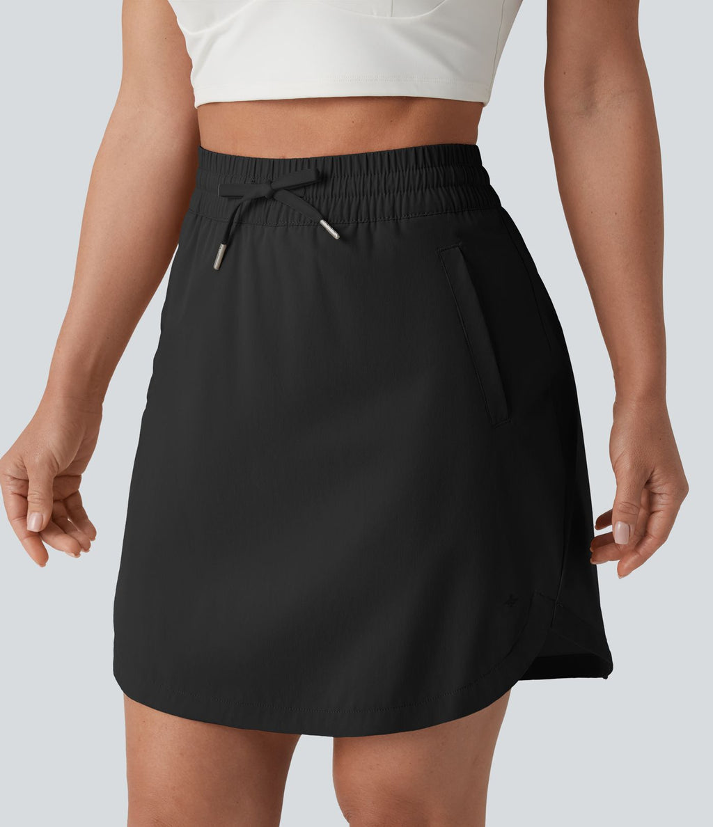 Jupe-short golf mini 2-en-1 taille haute à cordon de serrage et ourlet arrondi avec poches - Longueur plus longue