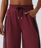 Pantalon de jogging casual large color block taille haute avec cordon de serrage, ourlet courbe et poches
