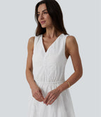 Robe mi-longue fluide col V sans manches avec nœud au dos