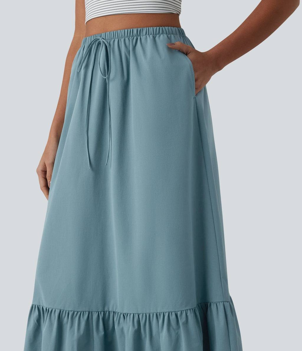 Jupe casual mi-longue évasée en popeline stretch taille haute avec cordon de serrage, ourlet volanté et poches