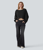 Sweat-shirt décolleté bateau à manches longues ourlet asymétrique
