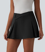 Jupe mini de golf plissée 2-en-1 DayStretch asymétrique taille mi-haute avec poches
