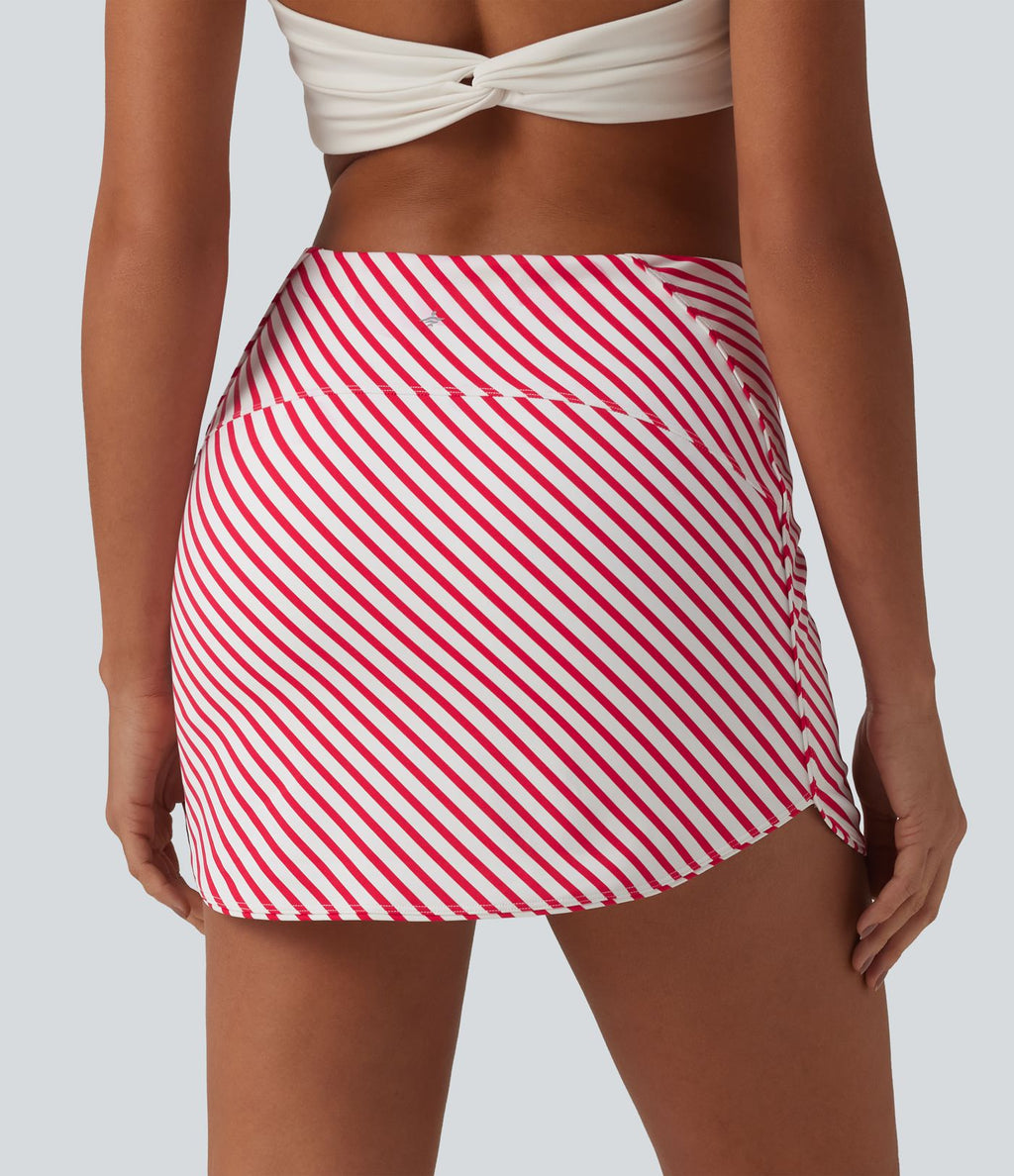 Jupe mini de tennis 2-en-1 à rayures taille haute avec ourlet arrondi et poches