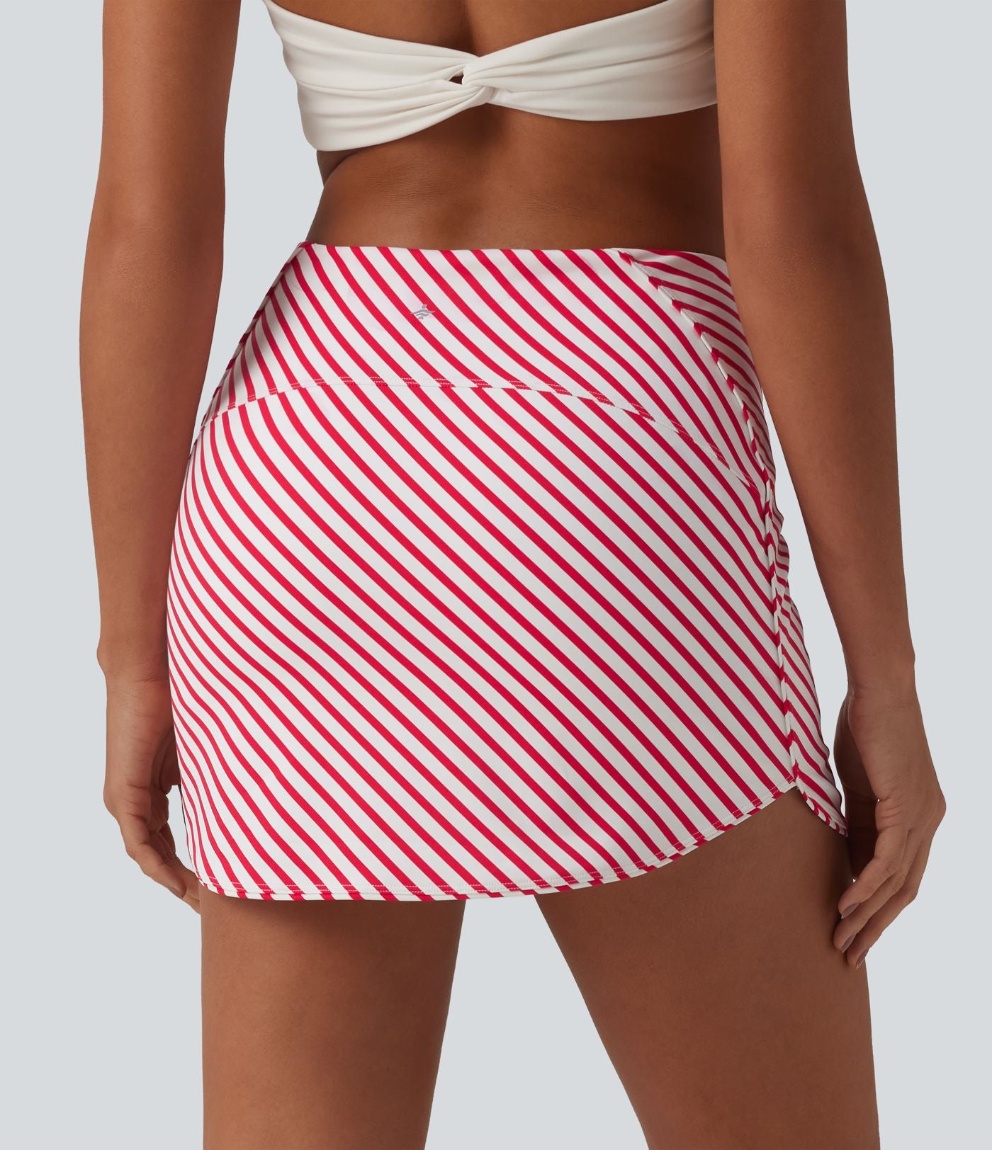 Jupe mini de tennis 2-en-1 à rayures taille haute avec ourlet arrondi et poches