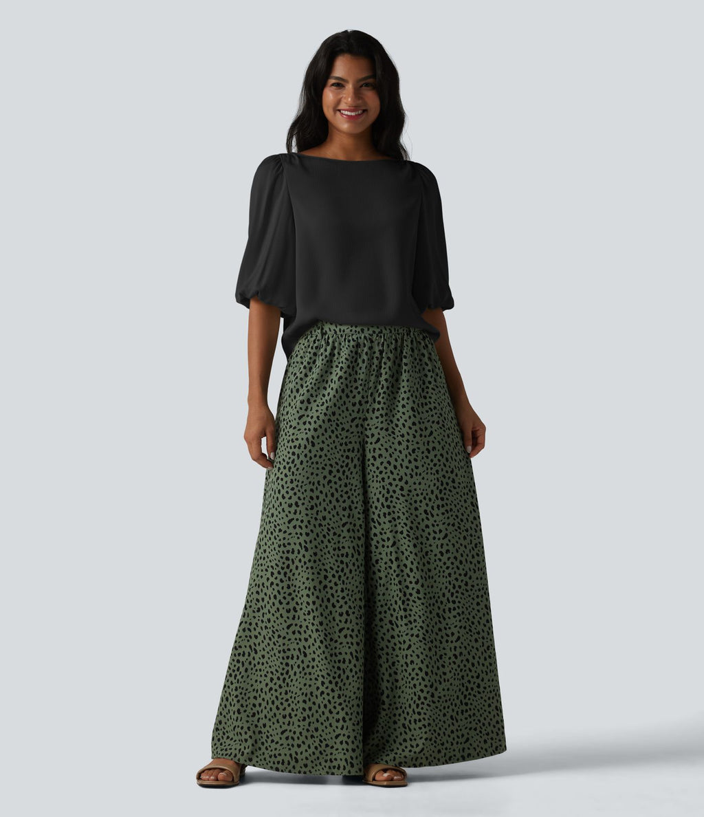 Blouse décontractée à manches bouffantes et ourlet arrondi texturé