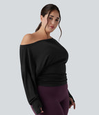 Haut de yoga grande taille asymétrique à manche longue, trou pour le pouce et fronces