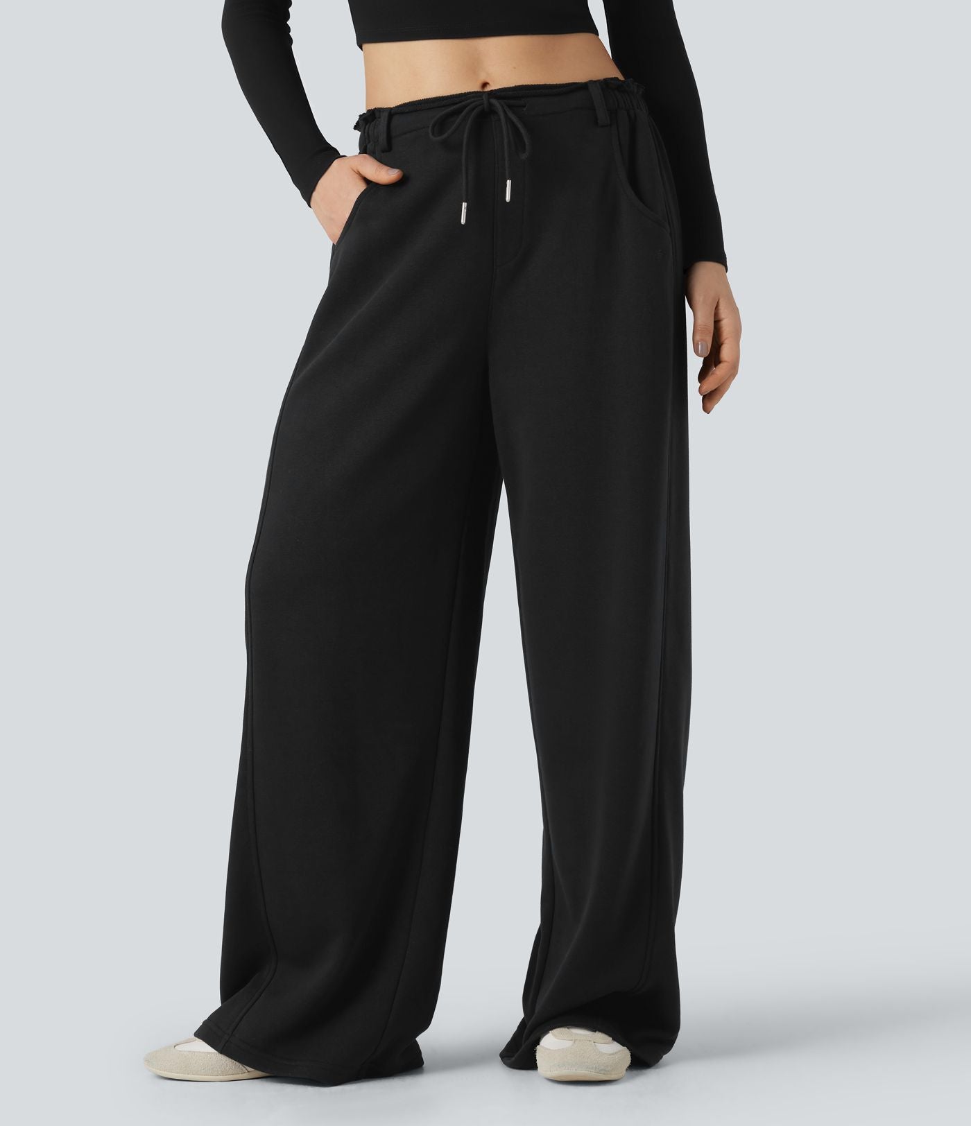 Pantalon jogging large taille mi-haute finition brute avec cordon de serrage et poches
