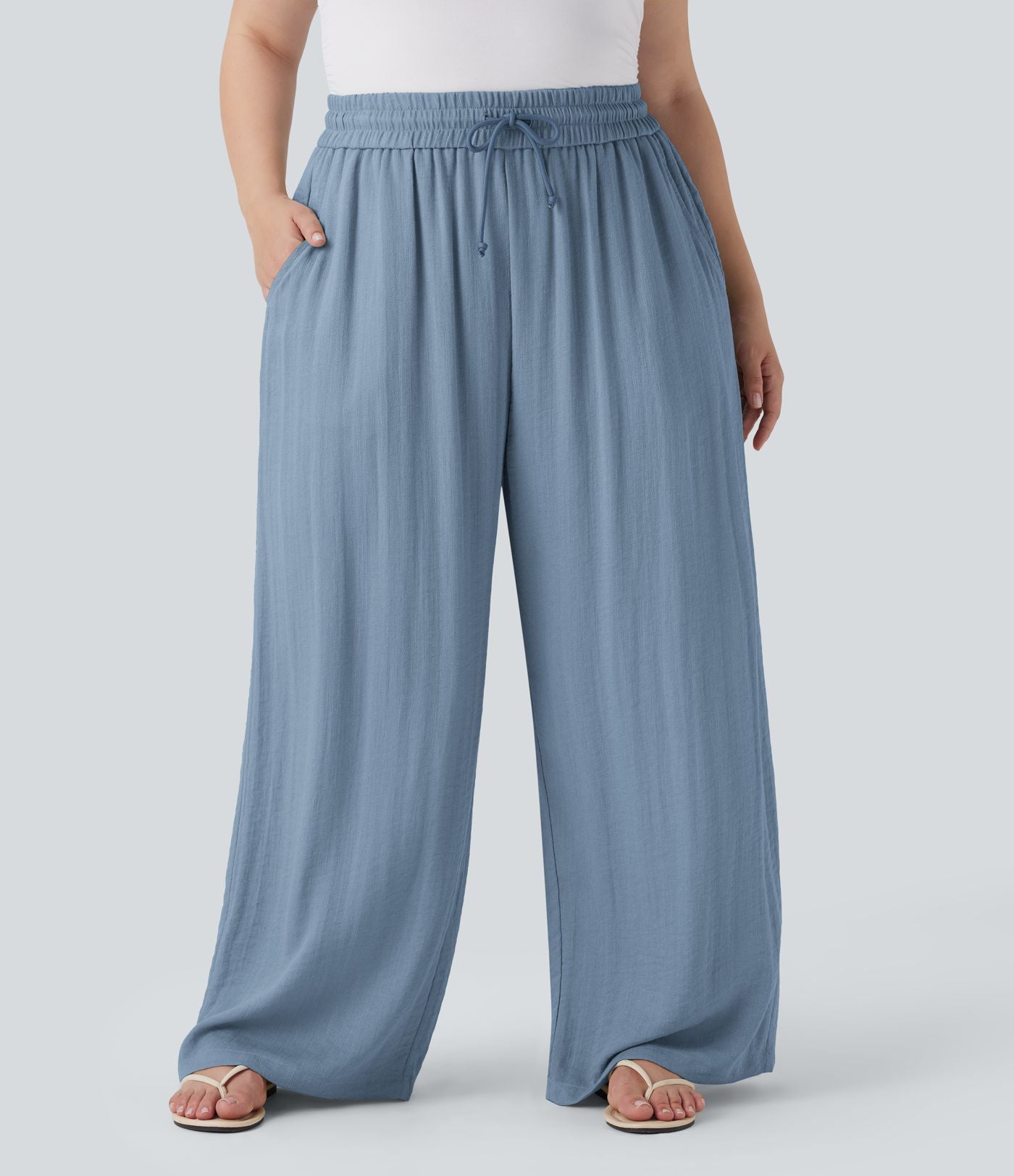 Pantalon décontracté grande taille large fluide taille haute effet lin avec cordon de serrage et poches