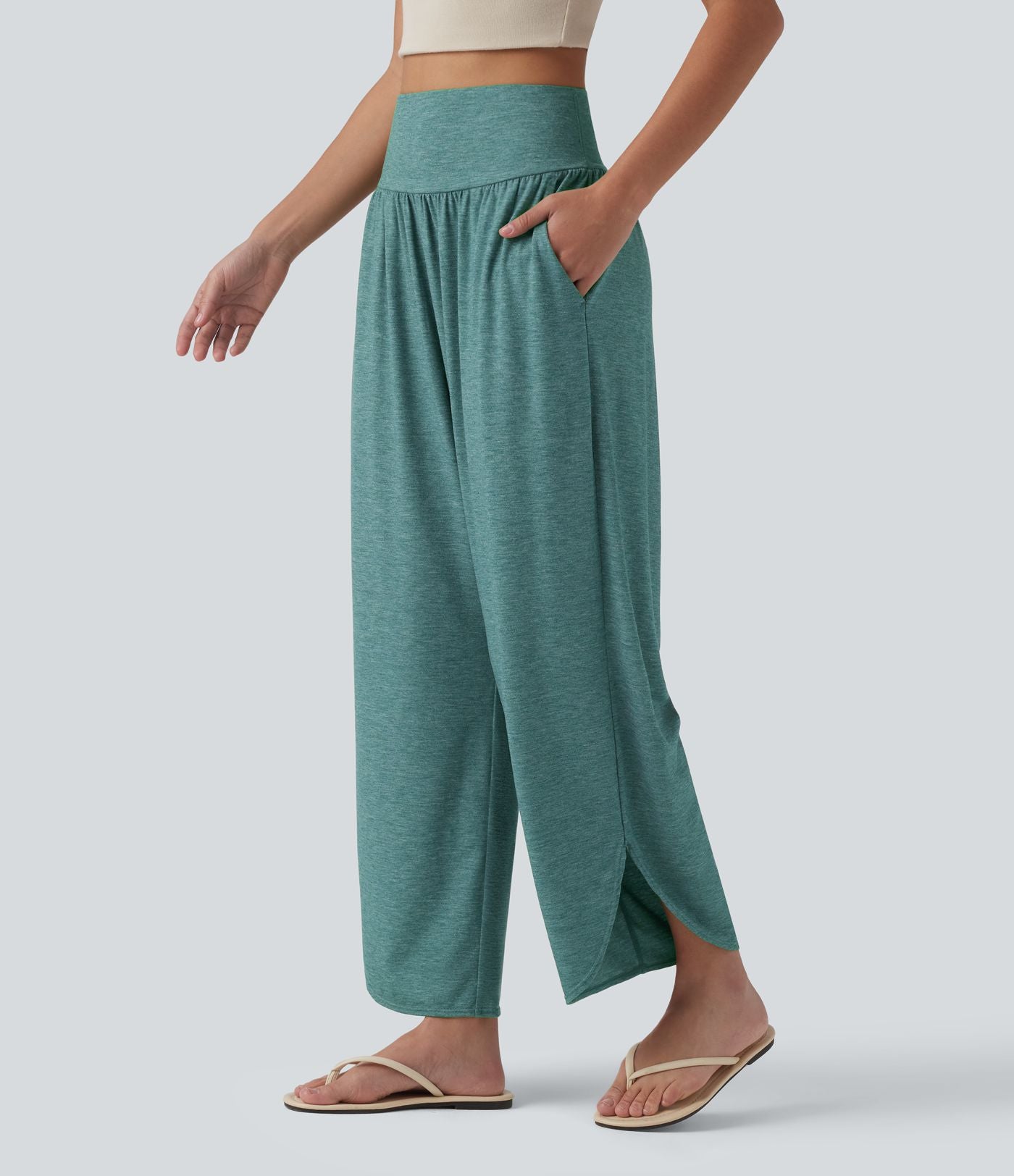 Pantalon décontracté taille haute gainant avec ourlet arrondi et poches