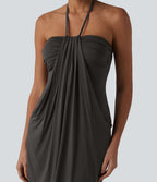 Robe resort mini dos nu à col licou avec lien noué dans le dos et poches
