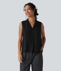 Blouse tailleur ample col revers sans manches à boutonnière