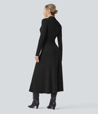 Robe longue côtelée col montant ceinturée manches longues