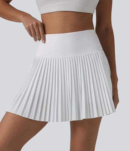 Breezeful™ Jupe mini de tennis plissée 2 en 1 taille haute séchage rapide avec poches
