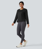 Top de sport running col rond manches longues à découpes