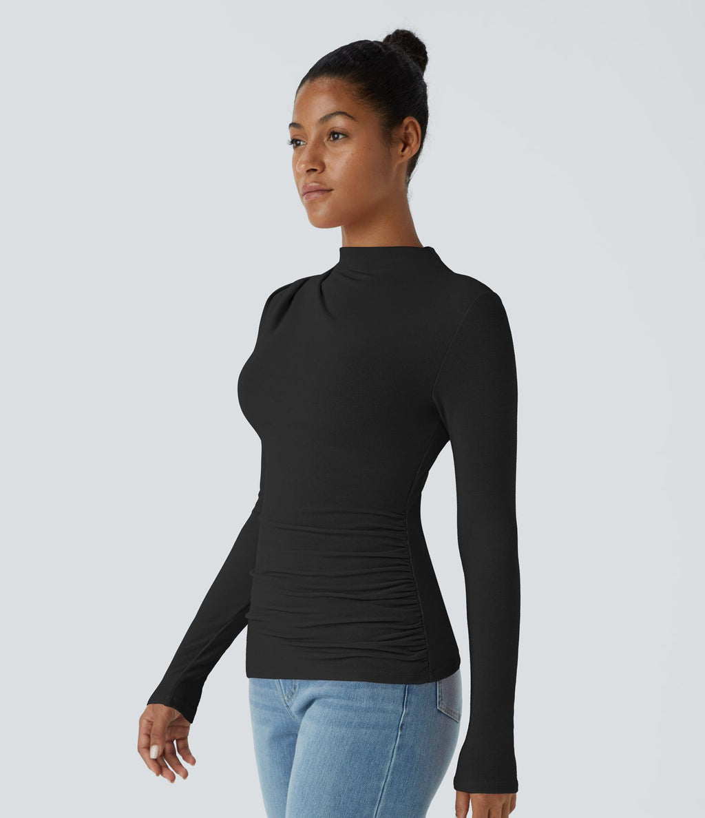 Haut thermique moulant à col cheminée, manches longues et fronces