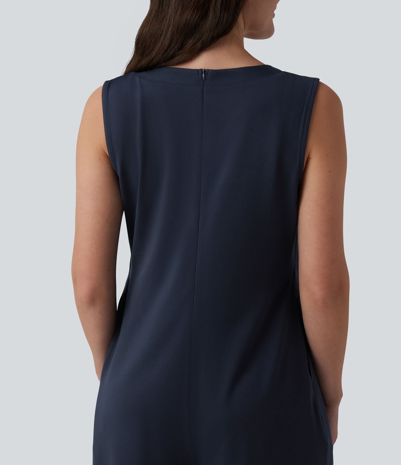 Combinaison casual ample décolleté plongeant sans manches plissée à nœud devant et fermeture éclair invisible avec poches