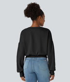 Sweat-shirt décontracté ample à col rond, épaules tombantes et manches évasées plissées