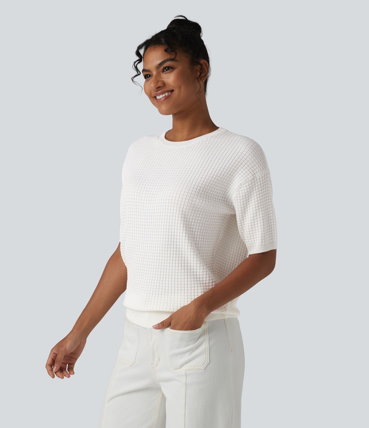Pull col rond manches courtes en tissu gaufré