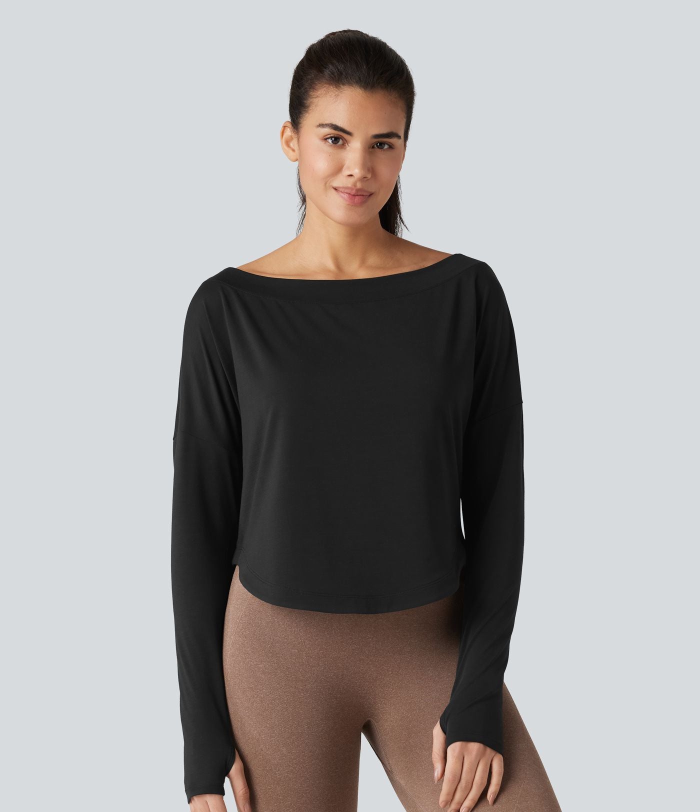 Top de sport yoga asymétrique une épaule manches longues avec trou pour le pouce, ourlet arrondi asymétrique et séchage rapide