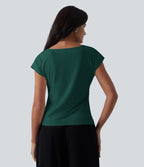 Blouse tailleur asymétrique col drapé manches courtes avec fronces et ourlet fendu
