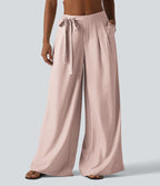 Pantalon large fluide taille haute en lin mélangé avec poches et liens latéraux