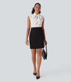 Chemise de travail sans manches à pois avec nœud devant