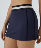 Jupe de tennis SoftlyZero™ Airy micro mini 2-en-1 à taille haute et color block ajustée au corps à effet frais InstantCool