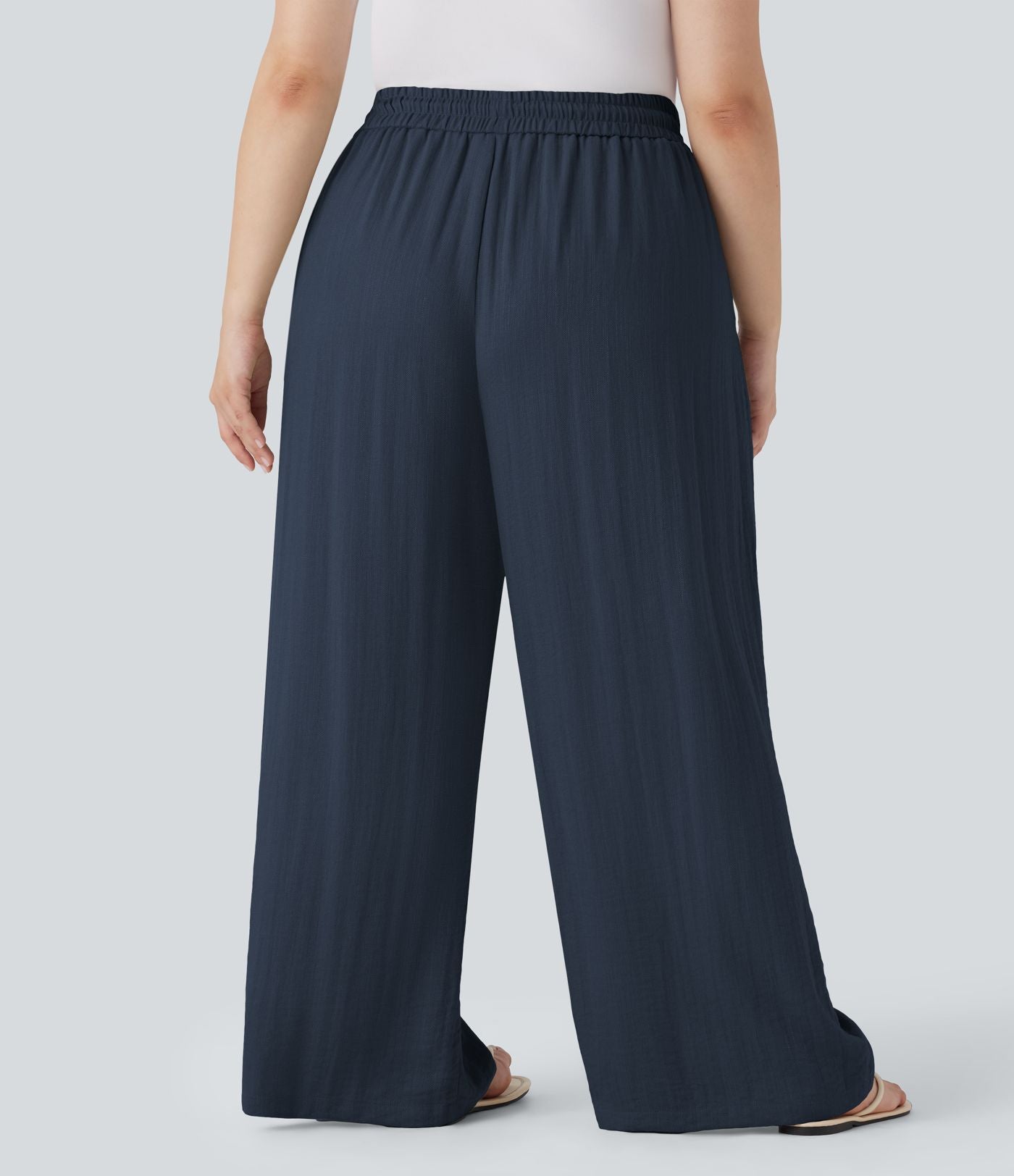 Pantalon décontracté grande taille large fluide taille haute effet lin avec cordon de serrage et poches