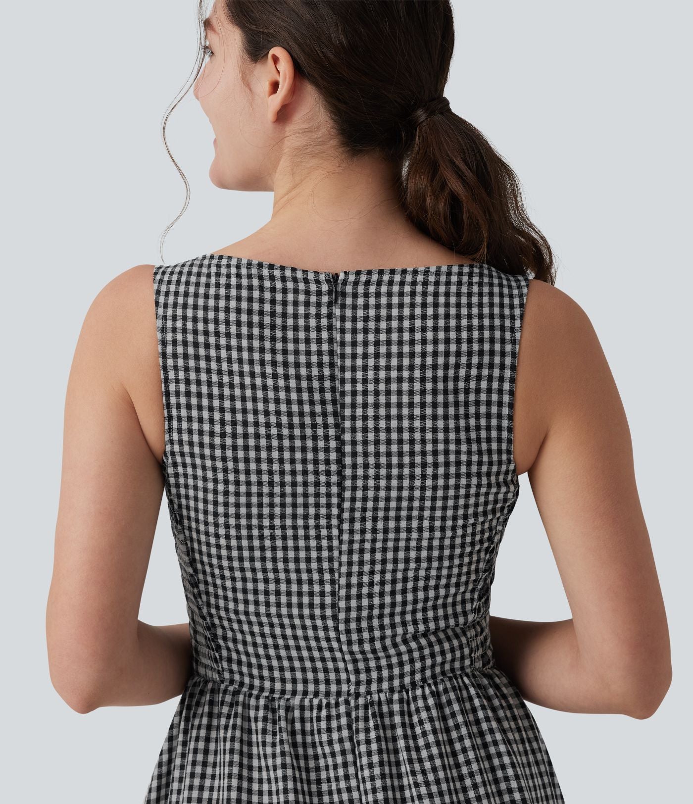 Robe longue fluide casual aspect lin col bateau sans manches à carreaux avec poches