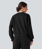 Sweat en coton molleton col rond manches longues avec poches