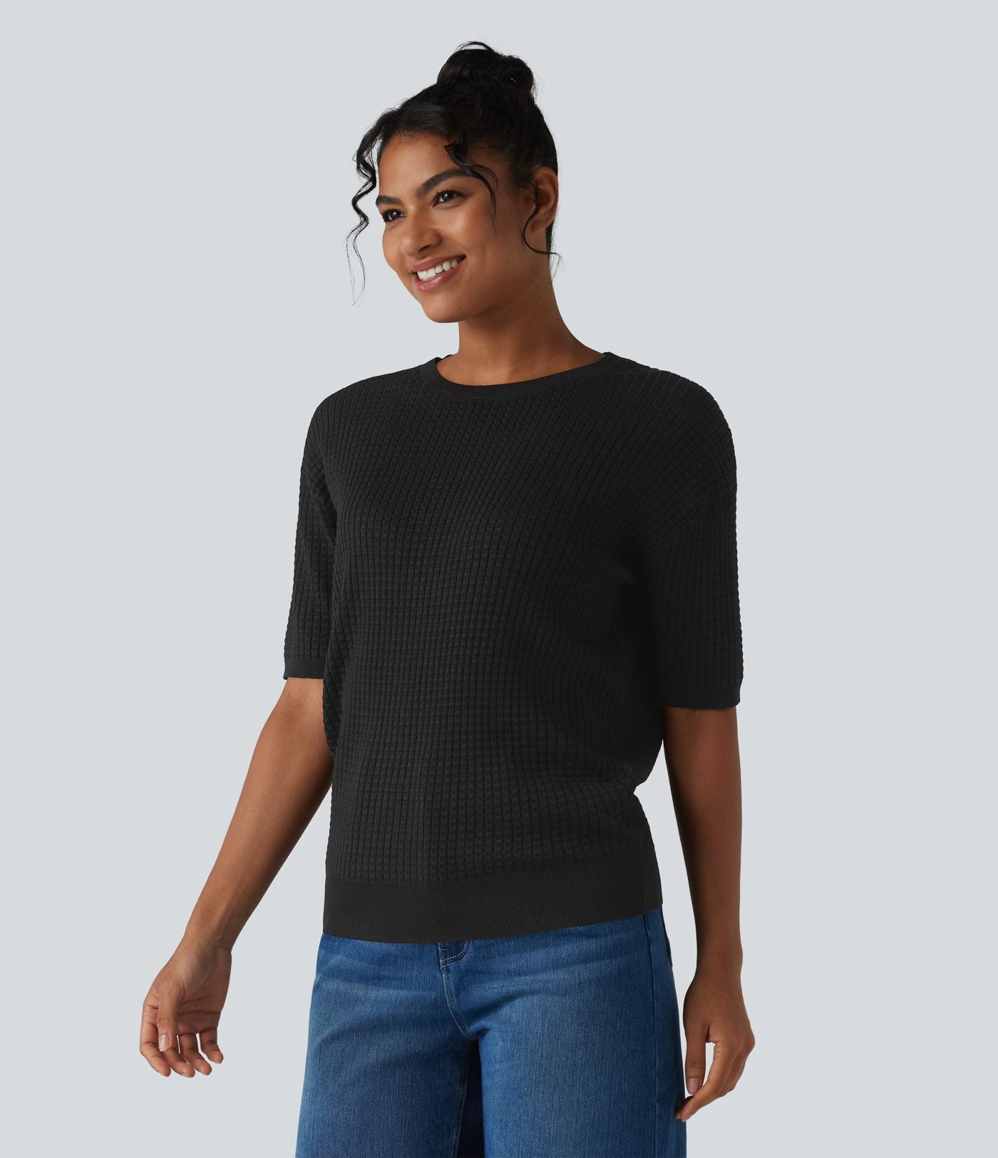 Pull col rond manches courtes en tissu gaufré
