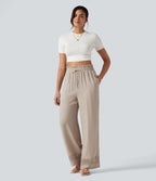 Pantalon effet lin taille haute avec cordon de serrage, bord volanté et poches