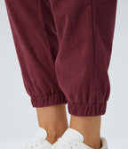Pantalon décontracté en velours côtelé avec taille mi-haute, boutons et fermeture éclair