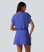 Robe de sport mini de yoga SoftlyZero™ Airy 2-en-1 effet frais InstantCool col rond à manches courtes, demi-zip et poches, accès facile Easy Peasy