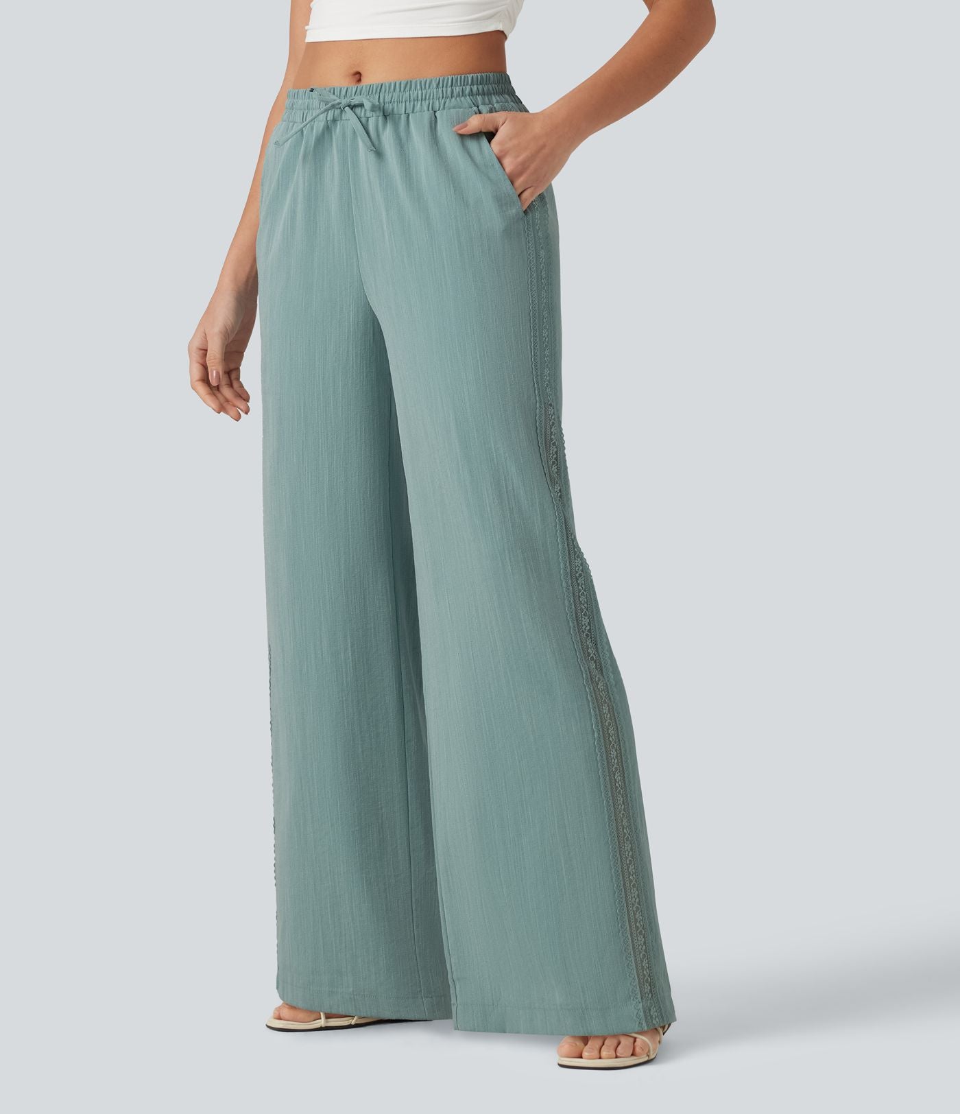 Pantalon large fluide casual 2 en 1 taille mi-haute avec cordon de serrage, dentelle contrastante, poches et aspect lin