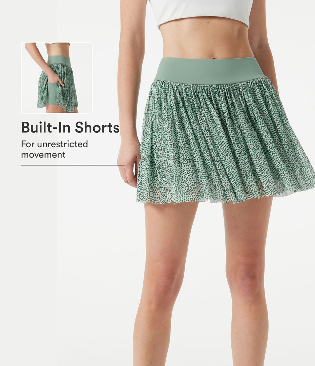 Jupe de sport mini 2-en-1 fluide taille mi-haute en mesh léopard avec poche