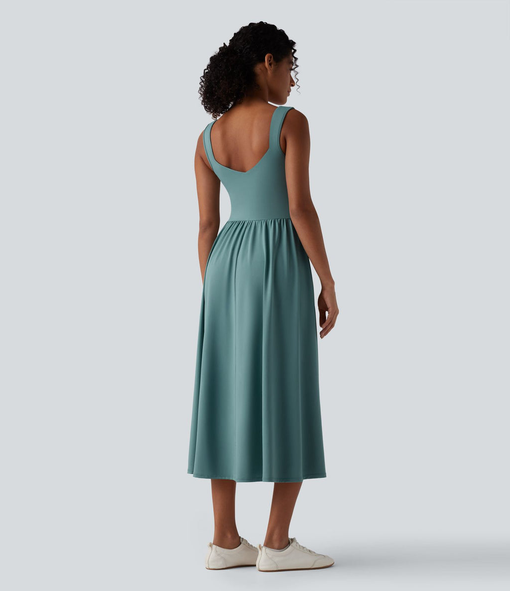 Robe midi fluide sans manches dos croisé ouvert avec poches