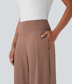 Pantalon large fluide taille haute avec poches latérales
