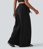 Pantalon large resort taille haute aspect lin avec nœud frontal et poches